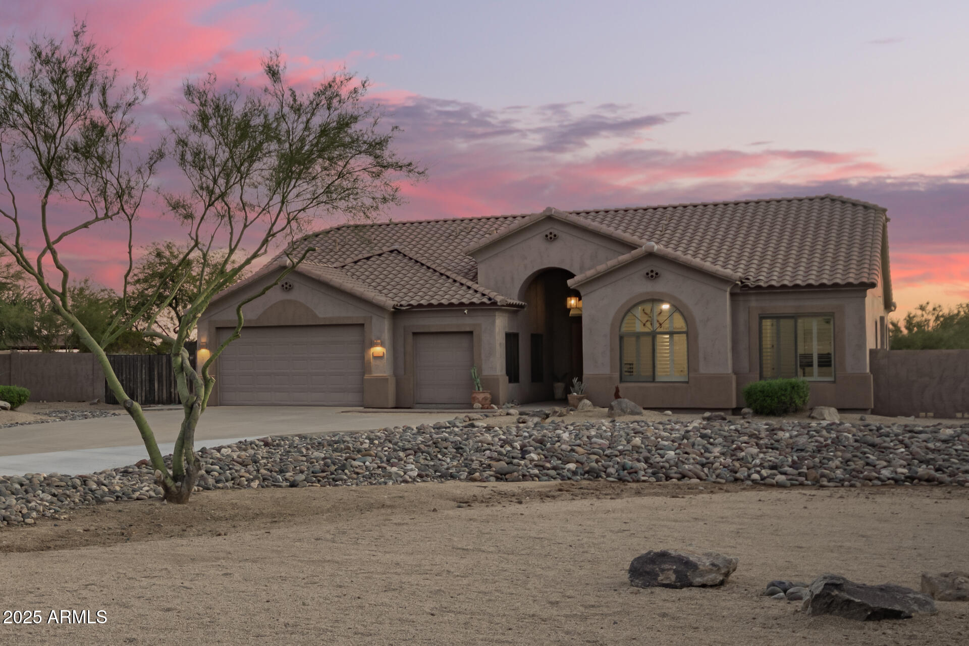 105 East Tanya Road Phoenix, AZ 85086 - Photo 10 of 63 a front view of a house with garden