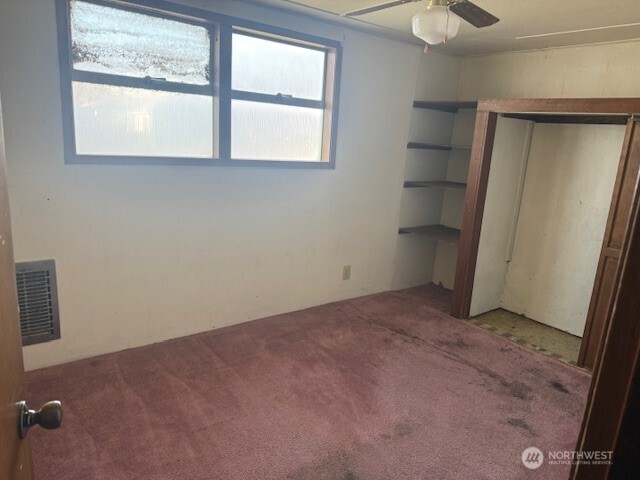 1206 Sunset Street Southeast Ephrata, WA 98823 - Photo 6 of 11 an empty room with windows