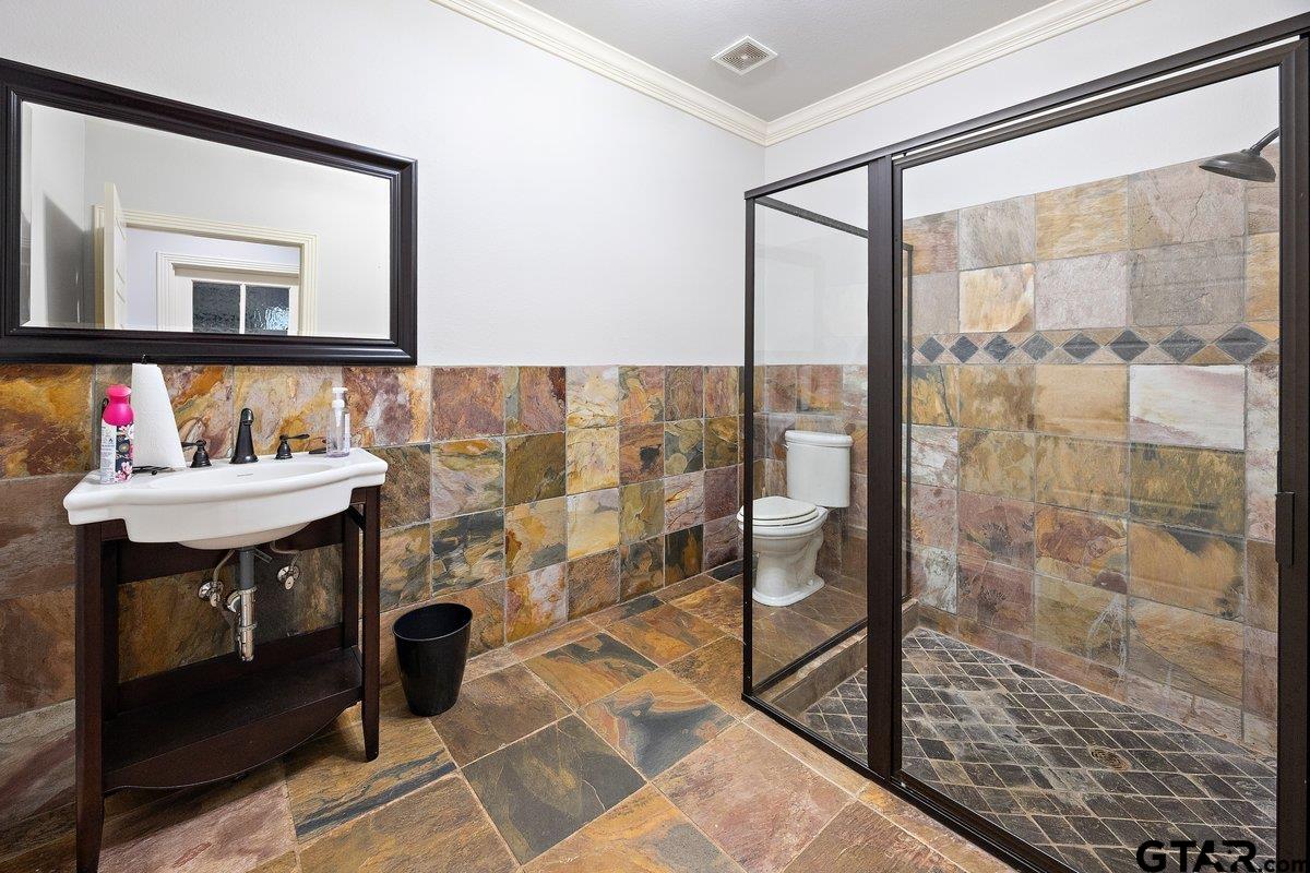 13089 US Highway 84 West Rusk, TX 75785 - Photo 27 of 43 a bathroom with a sink mirror and a shower