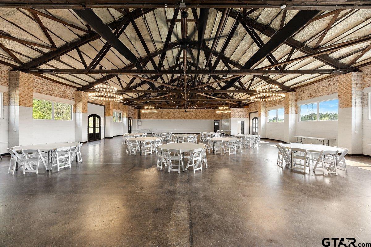 13089 US Highway 84 West Rusk, TX 75785 - Photo 4 of 43 a view of a room with lots of dining table chairs and wooden floor