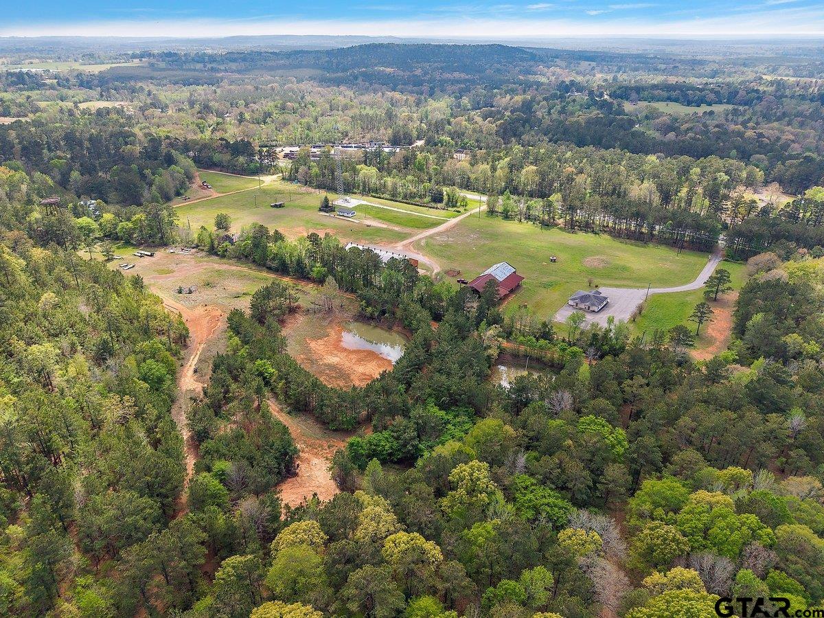 13089 US Highway 84 West Rusk, TX 75785 - Photo 41 of 43 an aerial view of residential houses with outdoor space and swimming pool