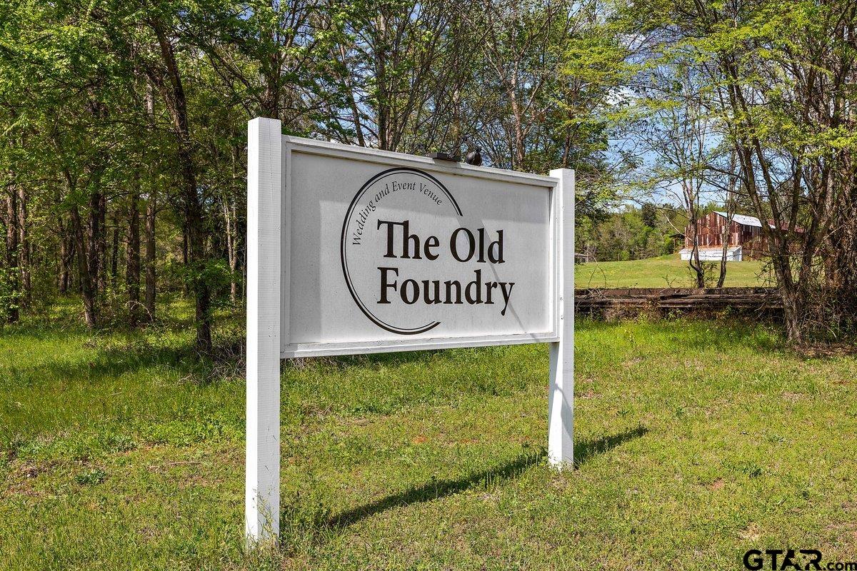 13089 US Highway 84 West Rusk, TX 75785 - Photo 43 of 43 a sign of golf club on a wall under a tree