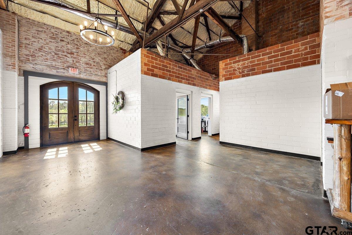 13089 US Highway 84 West Rusk, TX 75785 - Photo 6 of 43 a view of a livingroom with wooden floor and stairs