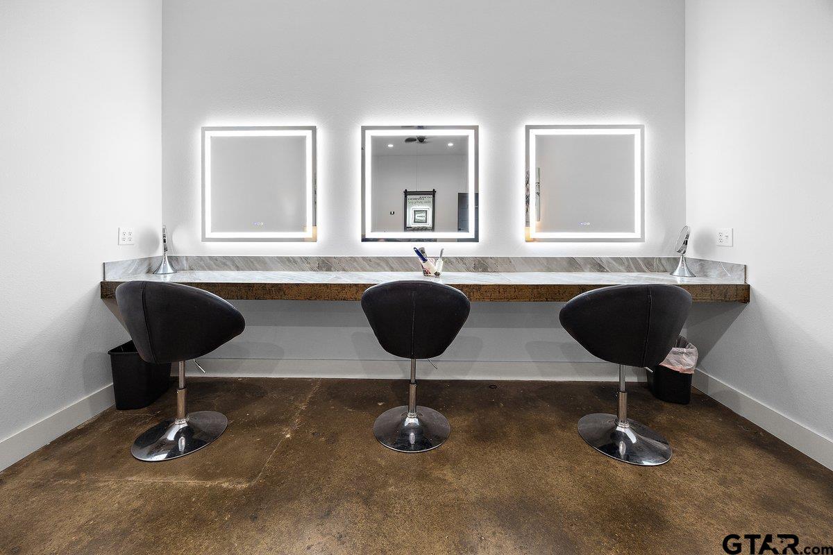 13089 US Highway 84 West Rusk, TX 75785 - Photo 9 of 43 a room with table chairs and mirrors