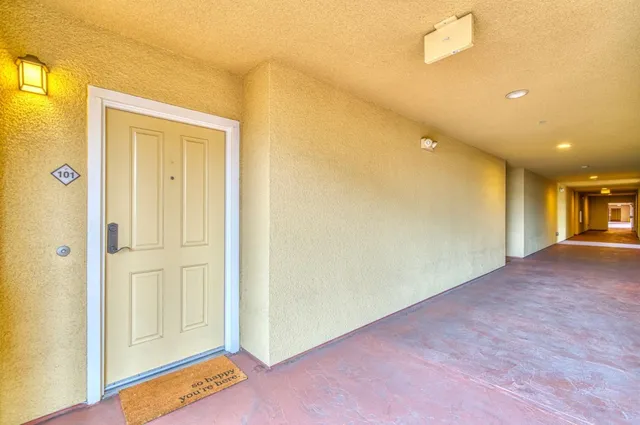 a room with gym equipment and gym equipment