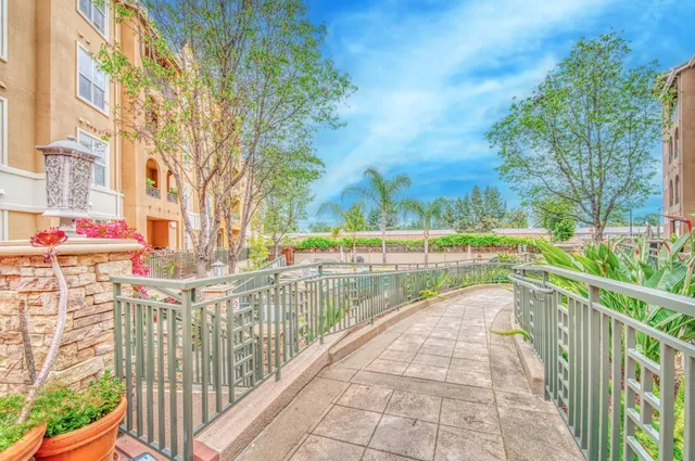 a view of a building with a garden