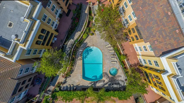 an aerial view of a house with a garden