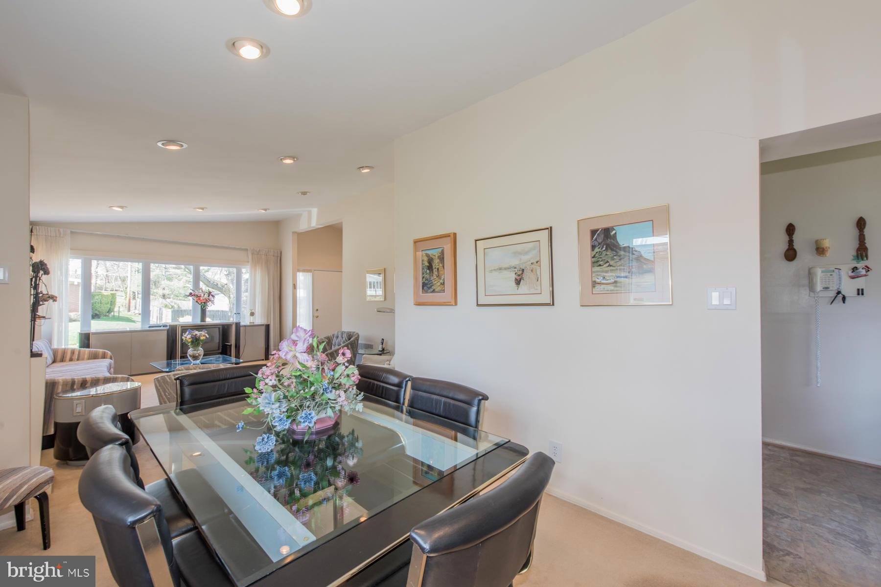 4703 Belle Forte Road Baltimore, MD 21208 - Photo 3 of 19 a view of a dining room with furniture window and outside view