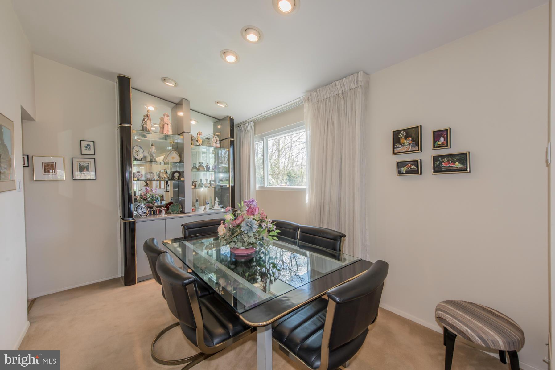 4703 Belle Forte Road Baltimore, MD 21208 - Photo 8 of 19 a view of a dining room with furniture