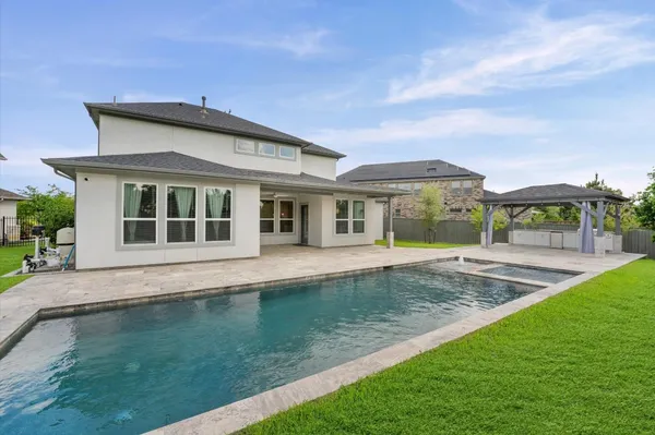 $935,000 | 7 Hyacinth Blossom Court, Tomball, TX 77375