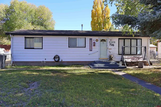 a view of a house with a swimming pool