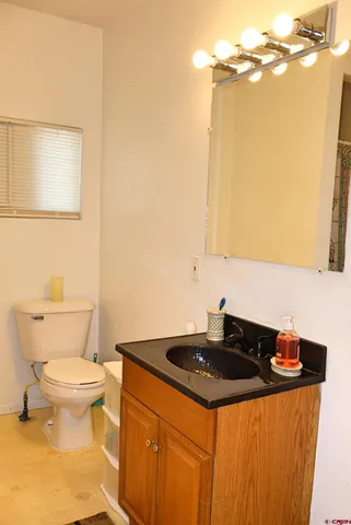 a bathroom with a sink and a toilet