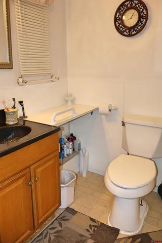 a bathroom with a toilet and a sink