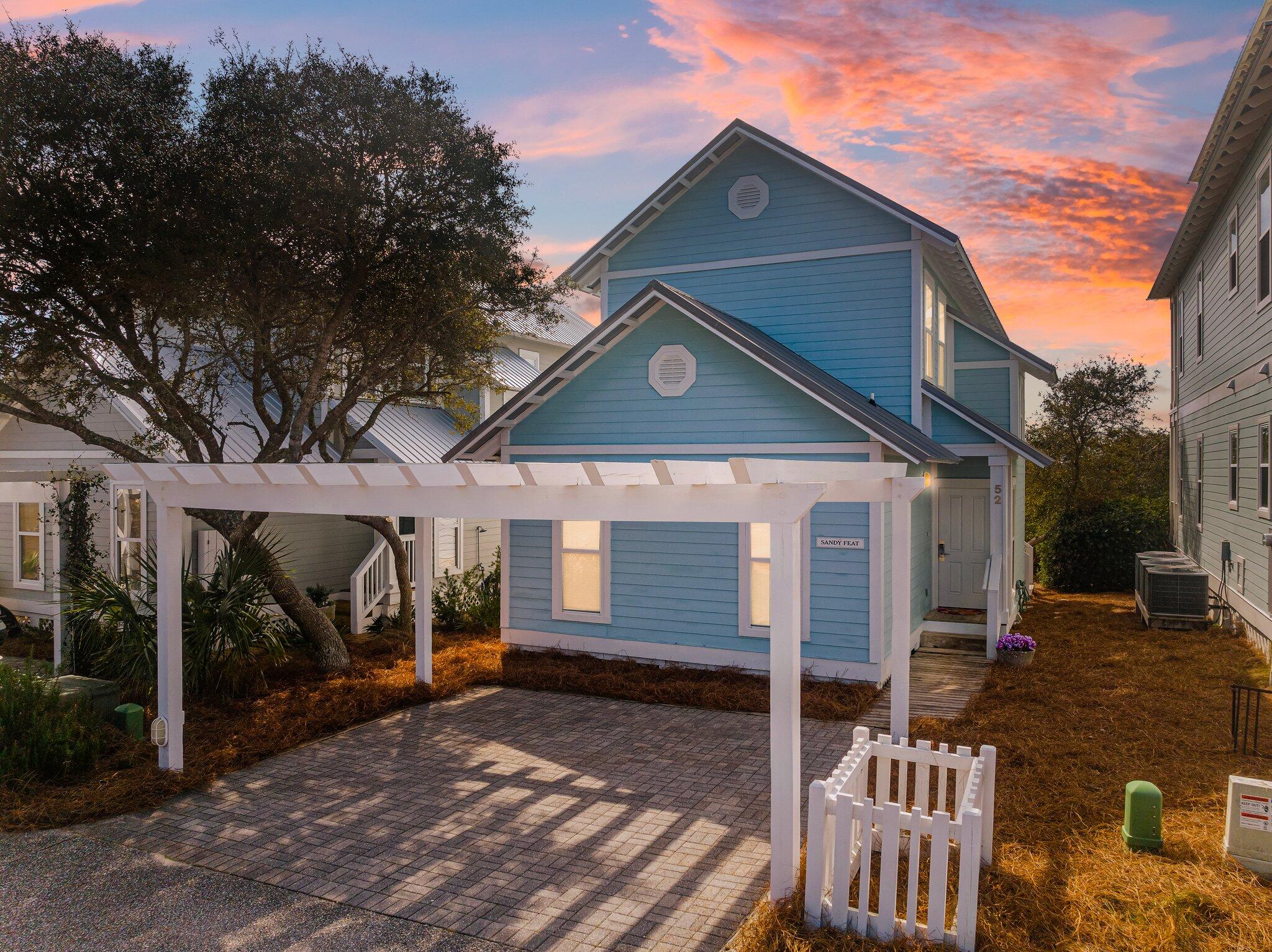 52 Cottage Way, Unit 5 Inlet Beach, FL 32461 - Photo 1 of 54 a front view of a house with garden