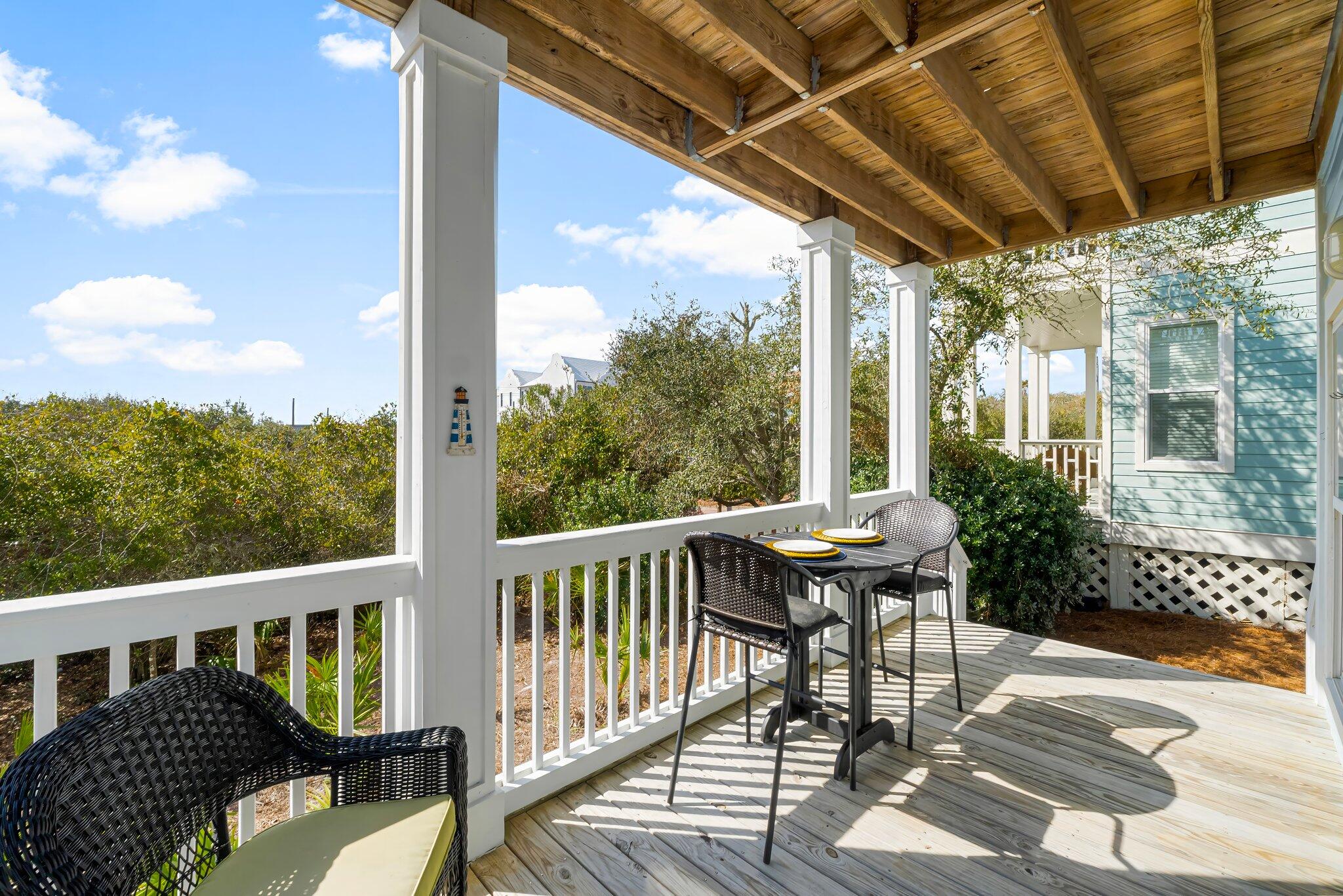 52 Cottage Way, Unit 5 Inlet Beach, FL 32461 - Photo 11 of 54 a view of a chair and table in the balcony
