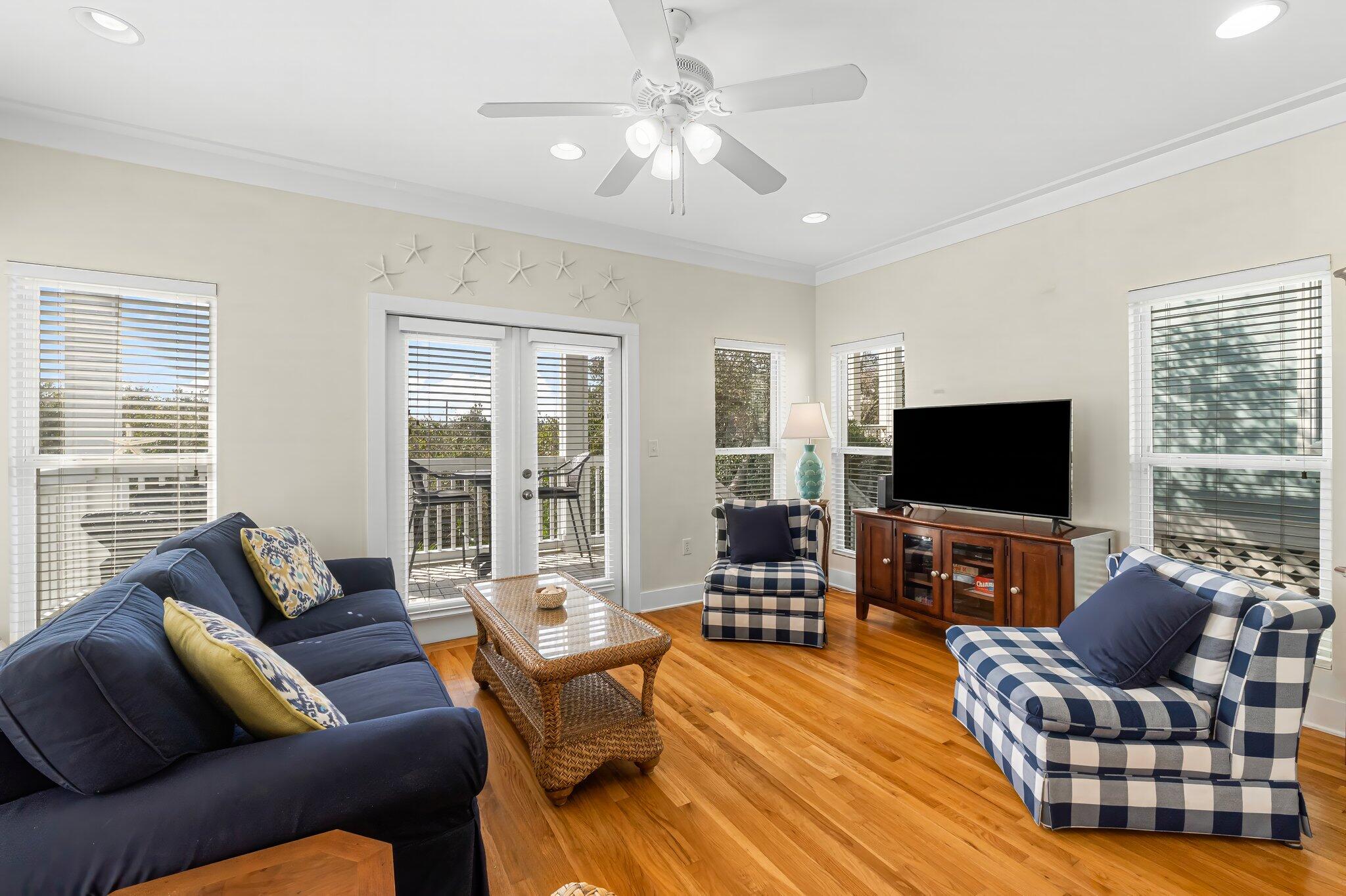 52 Cottage Way, Unit 5 Inlet Beach, FL 32461 - Photo 13 of 54 a living room with furniture and a flat screen tv
