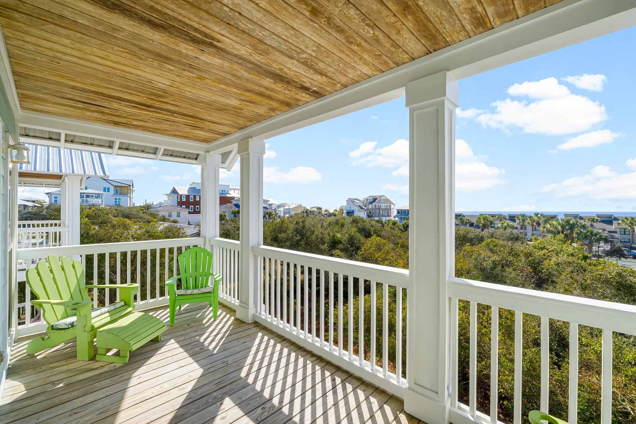 52 Cottage Way, Unit 5 Inlet Beach, FL 32461 - Photo 23 of 54 a view of a two chairs in the balcony