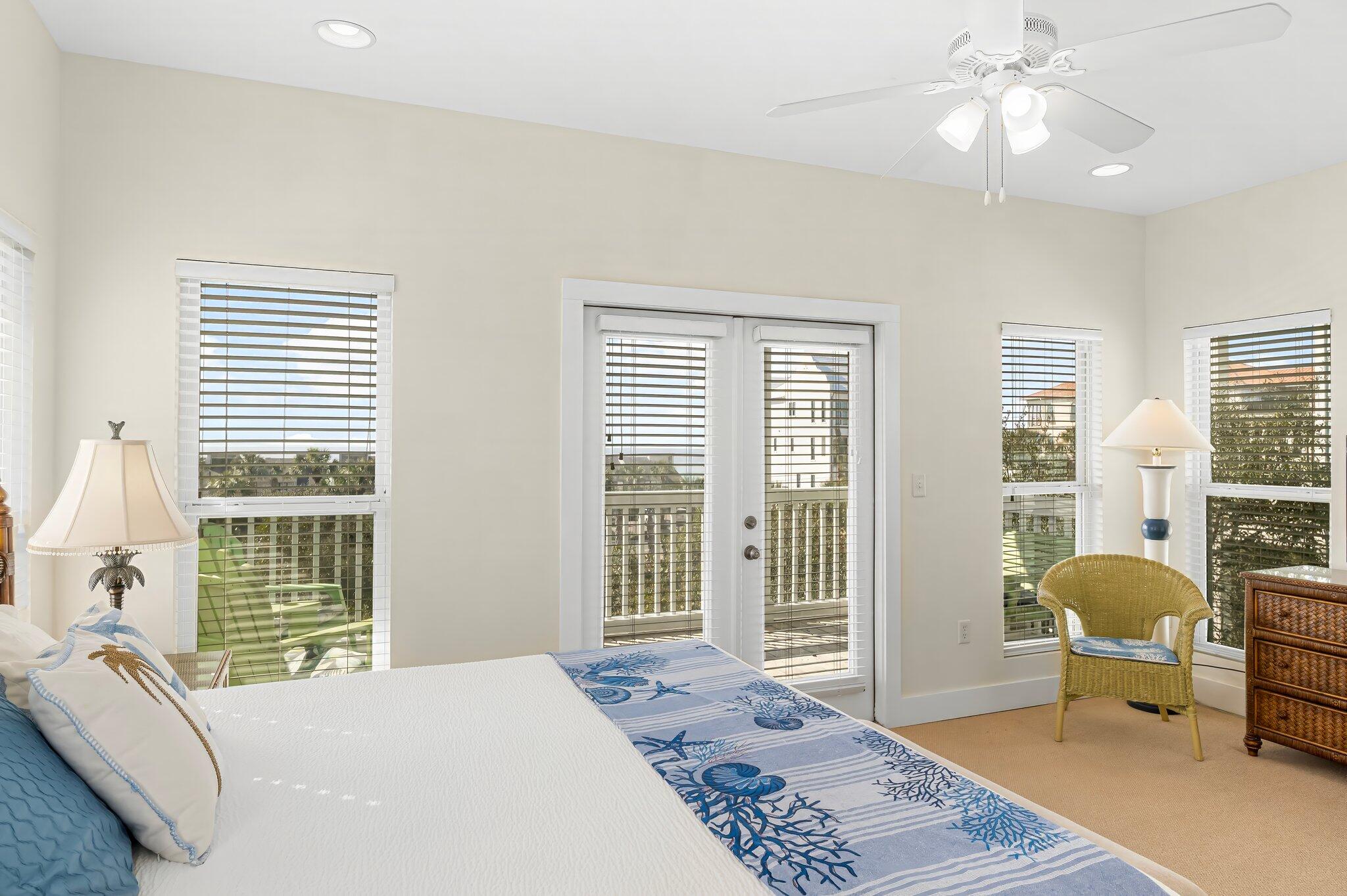 52 Cottage Way, Unit 5 Inlet Beach, FL 32461 - Photo 26 of 54 a bedroom with a bed a table and chair