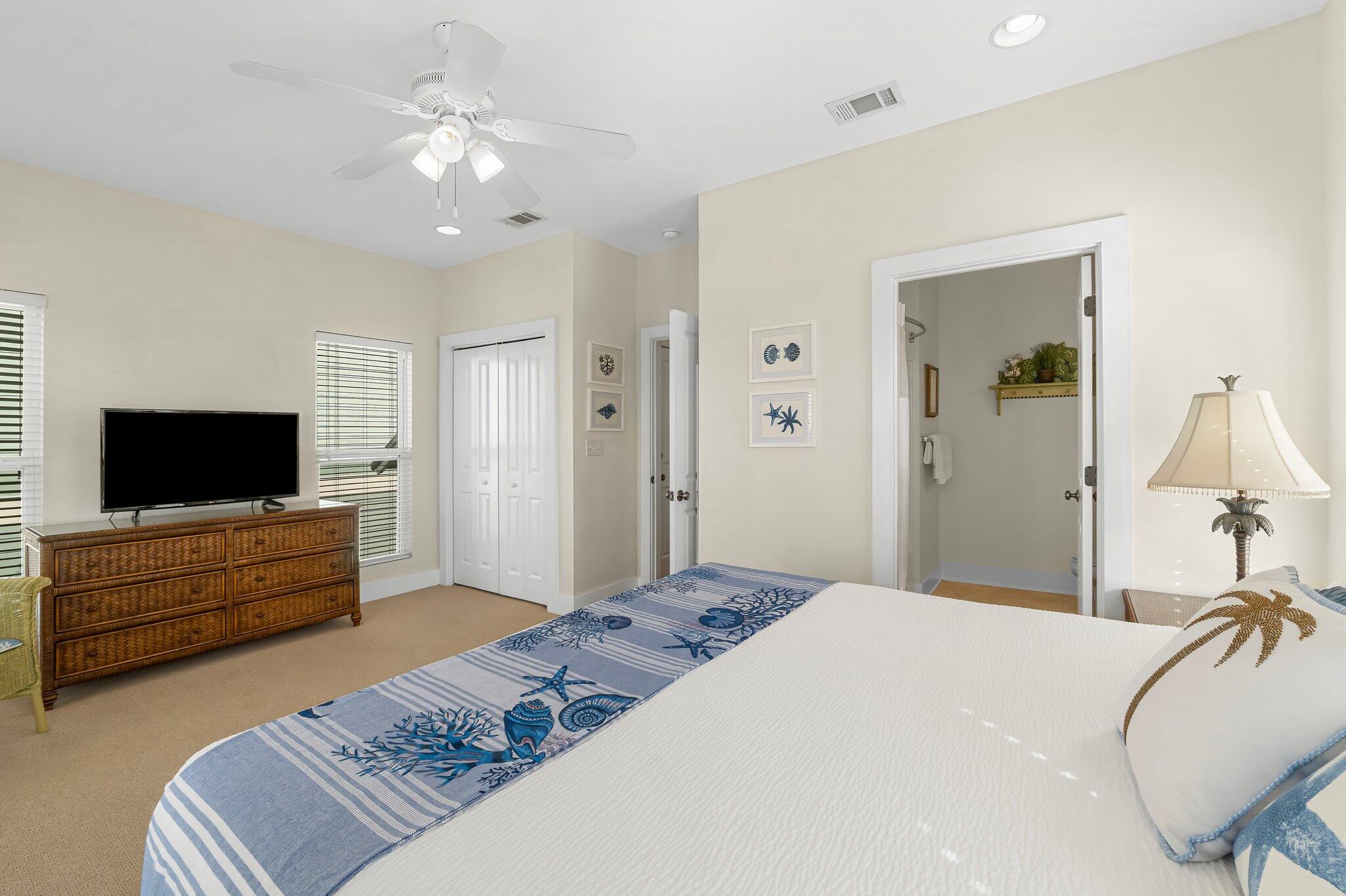 52 Cottage Way, Unit 5 Inlet Beach, FL 32461 - Photo 27 of 54 a bedroom with a bed and a flat screen tv
