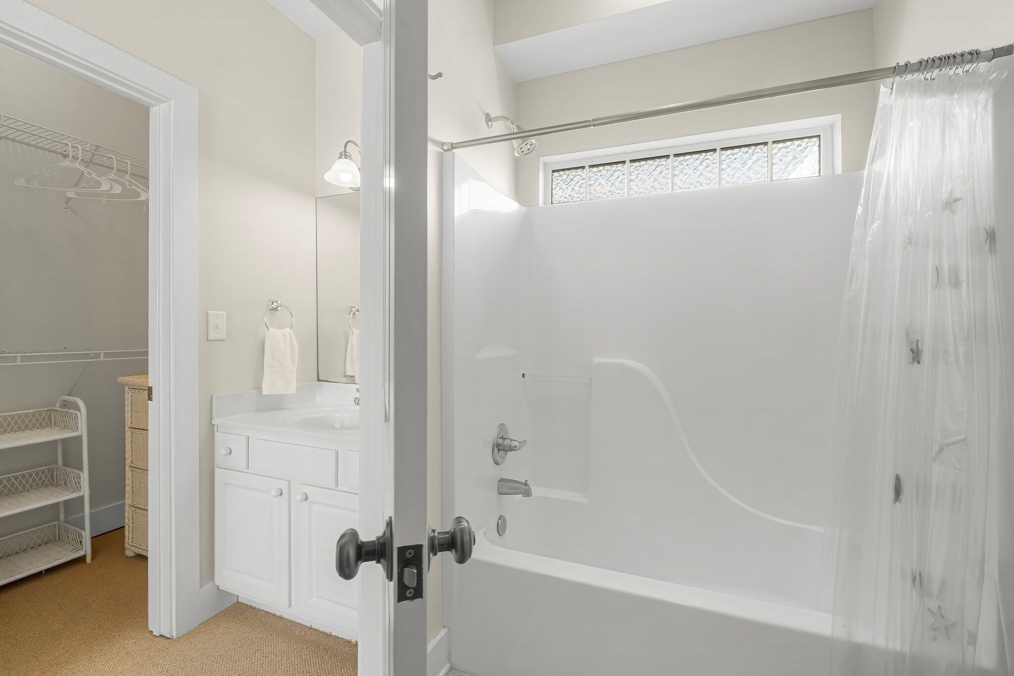 52 Cottage Way, Unit 5 Inlet Beach, FL 32461 - Photo 32 of 54 a bathroom with a bathtub