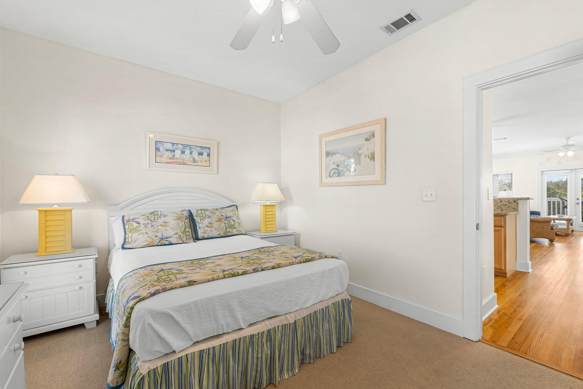52 Cottage Way, Unit 5 Inlet Beach, FL 32461 - Photo 33 of 54 a bedroom with a bed and a painting on the wall