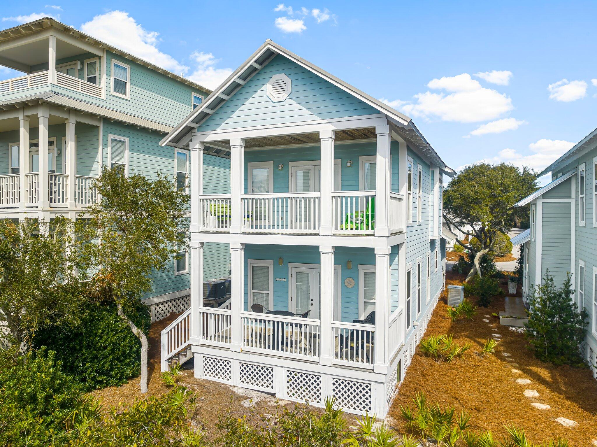52 Cottage Way, Unit 5 Inlet Beach, FL 32461 - Photo 40 of 54 a front view of a house with a yard