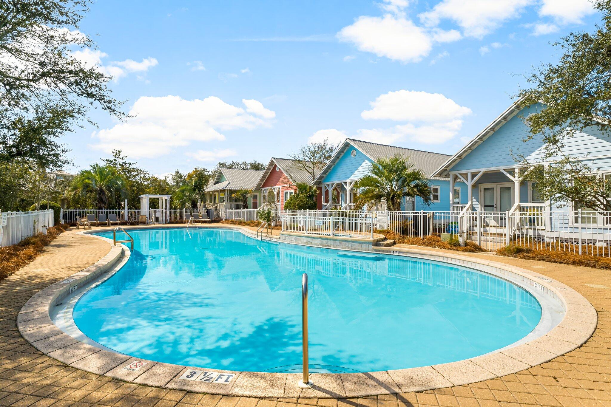 52 Cottage Way, Unit 5 Inlet Beach, FL 32461 - Photo 4 of 54 a view of a swimming pool with a patio