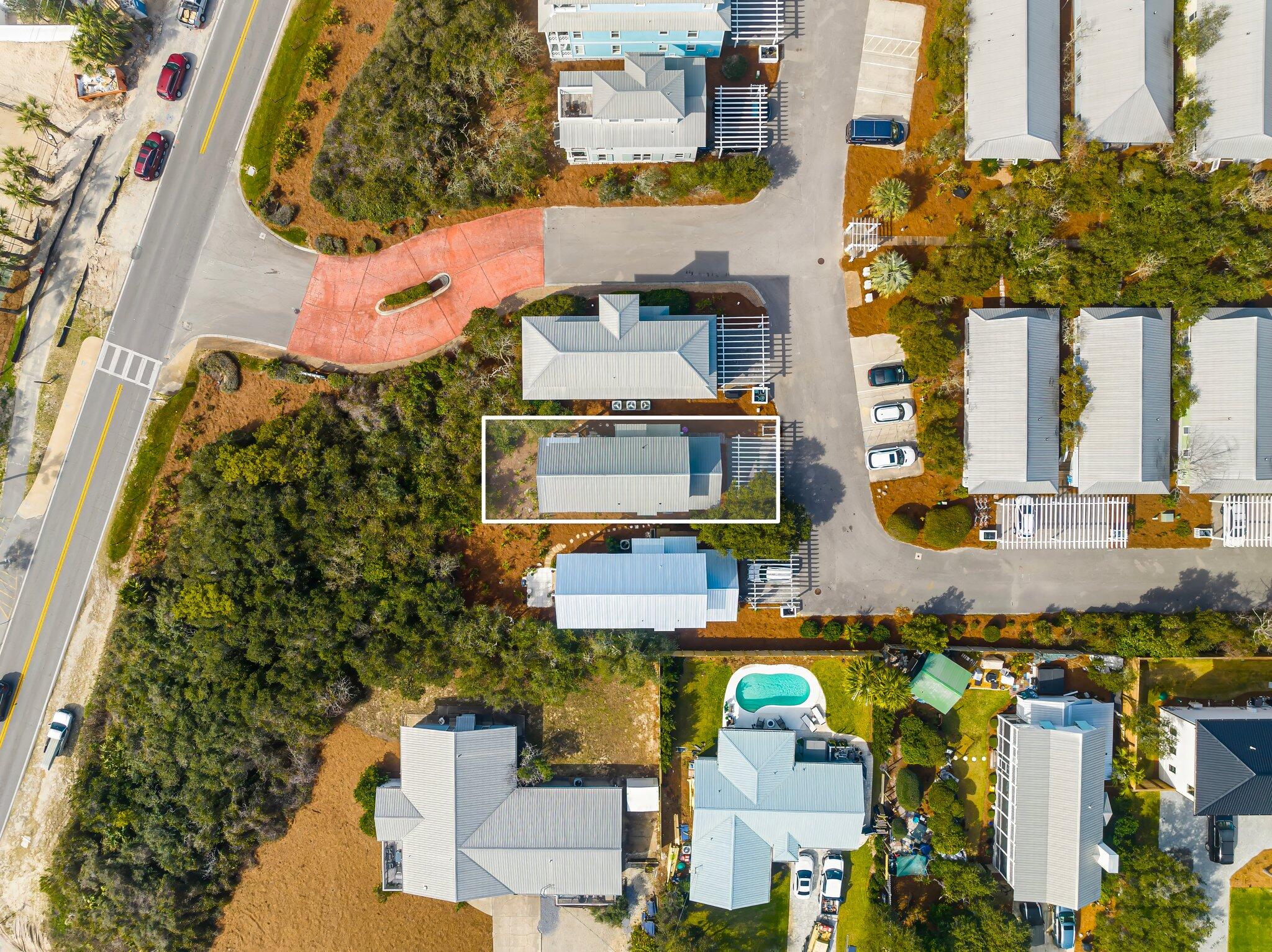 52 Cottage Way, Unit 5 Inlet Beach, FL 32461 - Photo 45 of 54 an aerial view of residential houses with outdoor space and parking