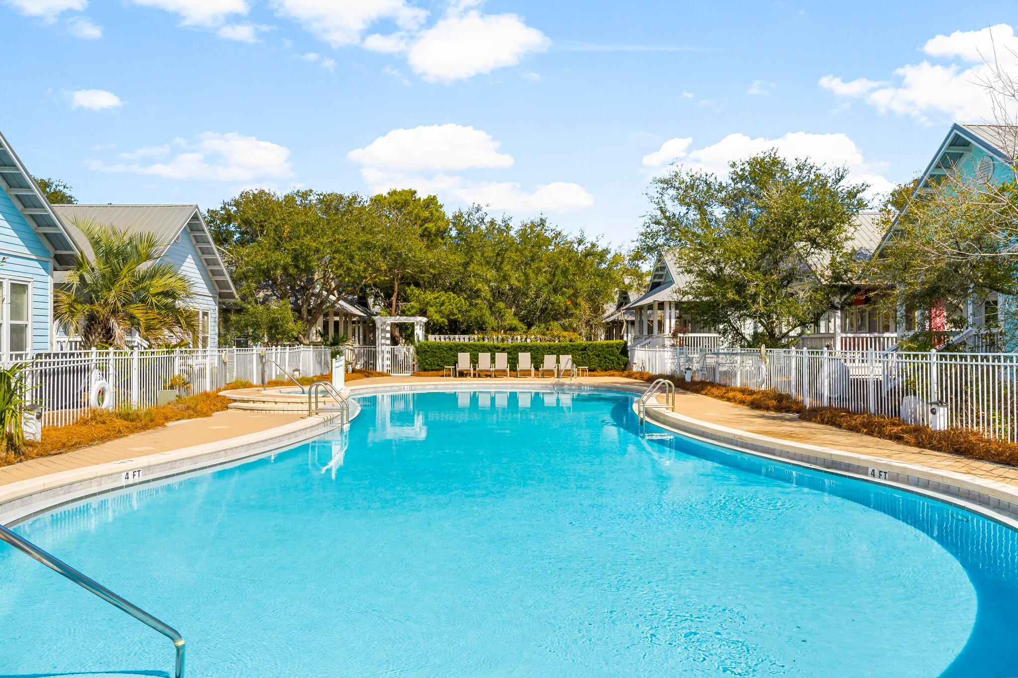 52 Cottage Way, Unit 5 Inlet Beach, FL 32461 - Photo 49 of 54 a view of a swimming pool with an outdoor seating and yard