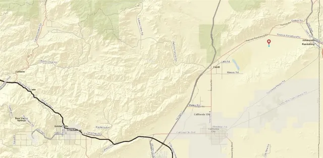 a white house with a clock on it