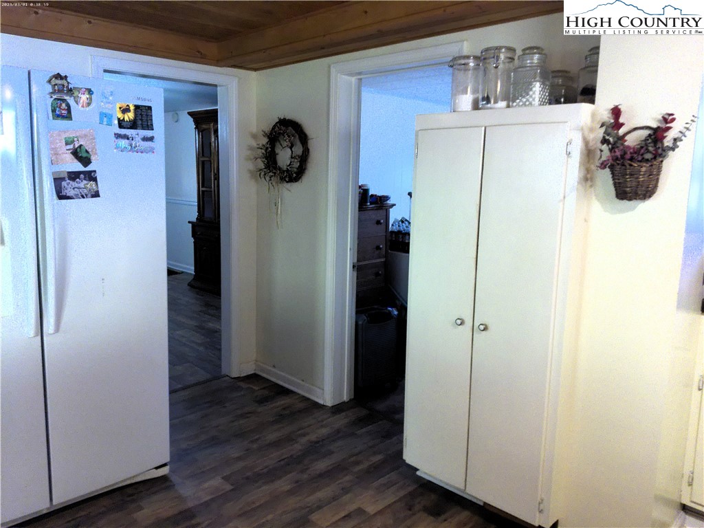 9752 Old Highway 16 Crumpler, NC 28617 - Photo 13 of 26 a view of walk in closet with clothes and shoes