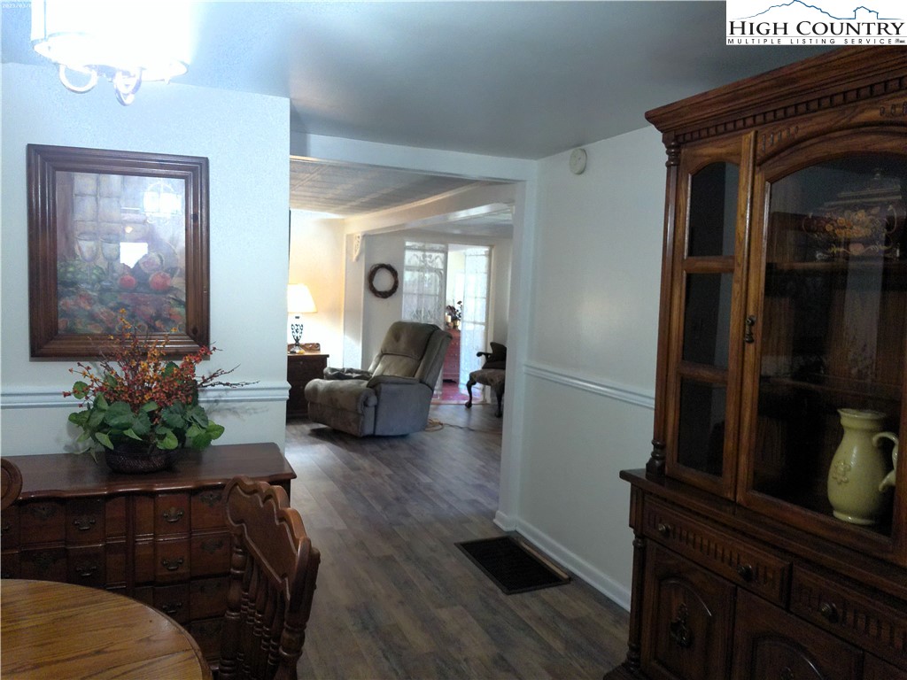 9752 Old Highway 16 Crumpler, NC 28617 - Photo 14 of 26 a living room with furniture and a potted plant