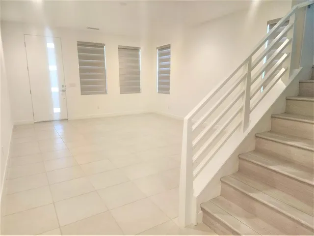 a view of an entryway with staircase