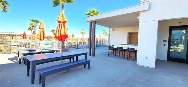 a sitting area with furniture and a potted plant