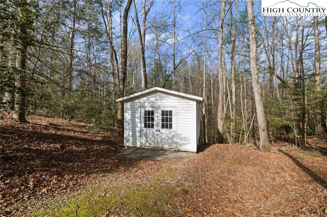 458 Jim Caudill Road Wilkesboro, NC 28697 - Photo 44 of 50 a front view of a house with a yard