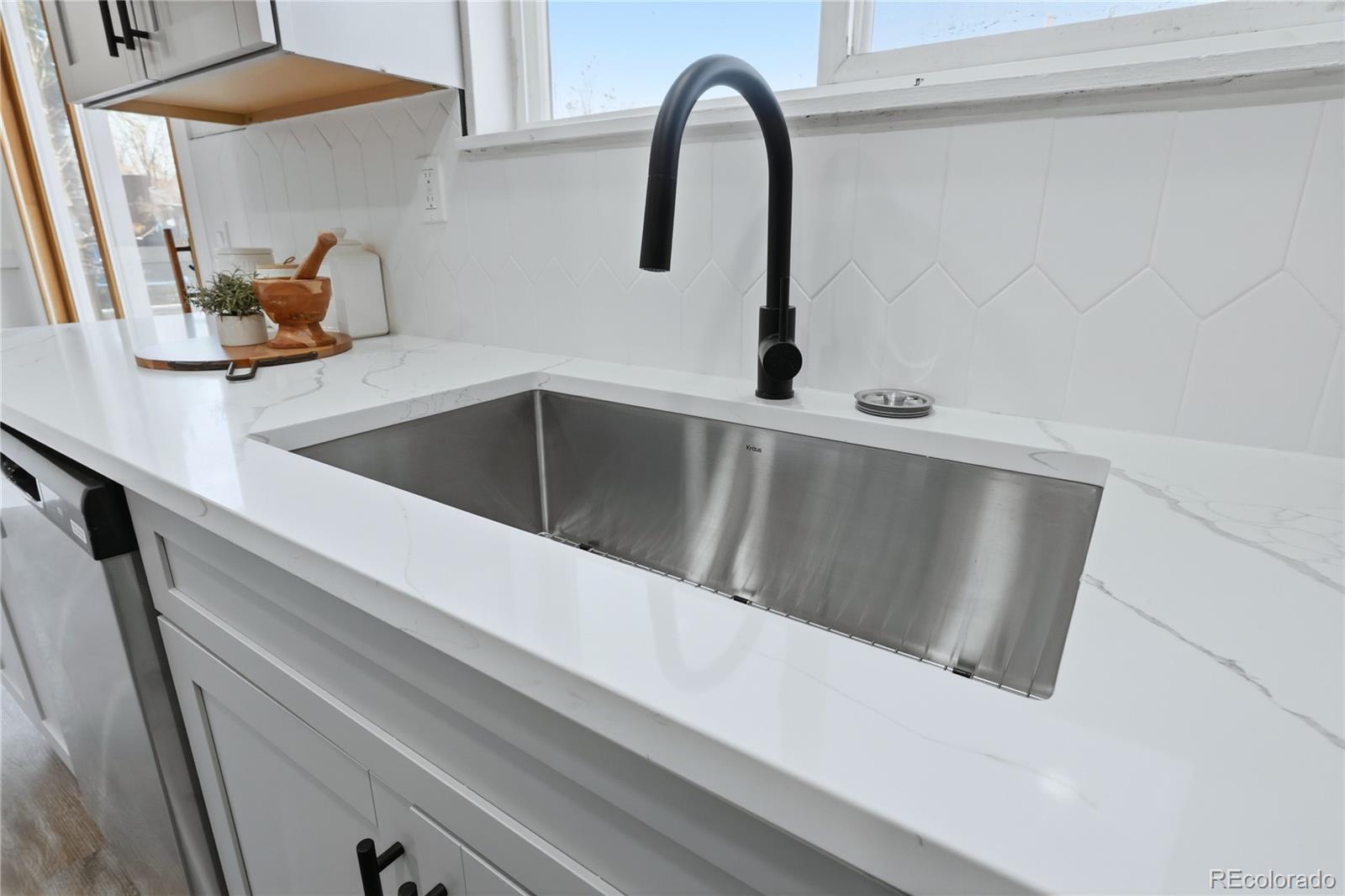 3173 South Nucla Street Aurora, CO 80013 - Photo 11 of 34 a close view of sink and tap