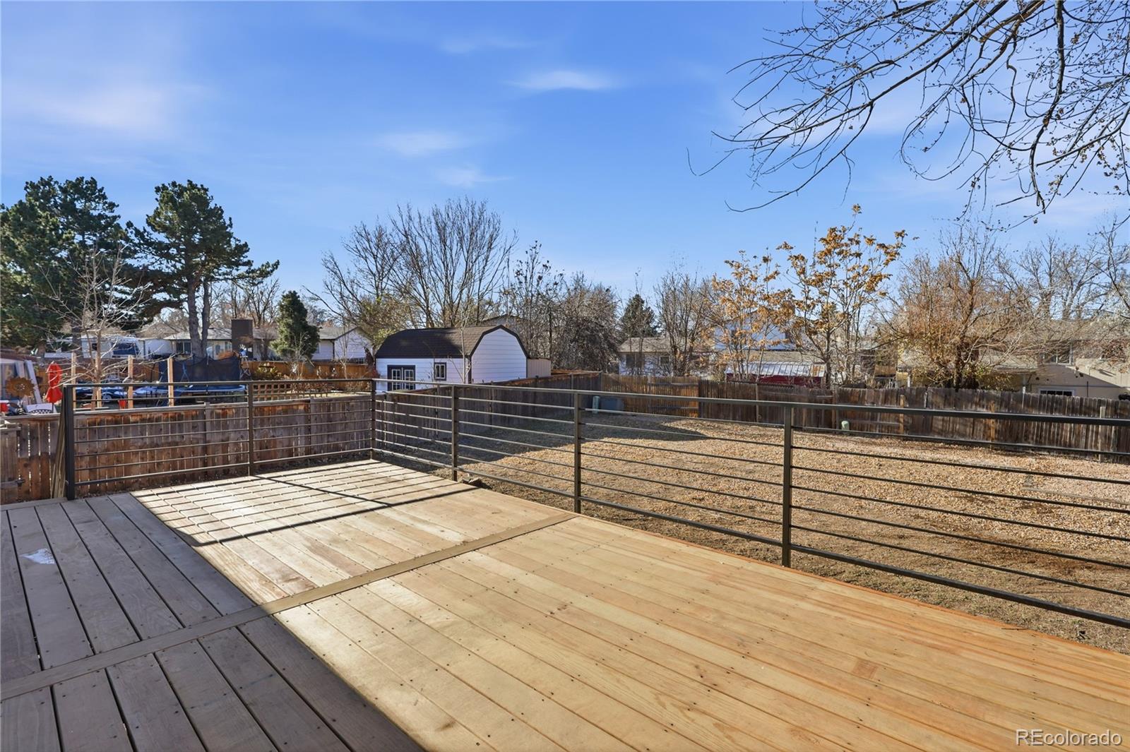 3173 South Nucla Street Aurora, CO 80013 - Photo 29 of 34 a view of outdoor space with wooden floor