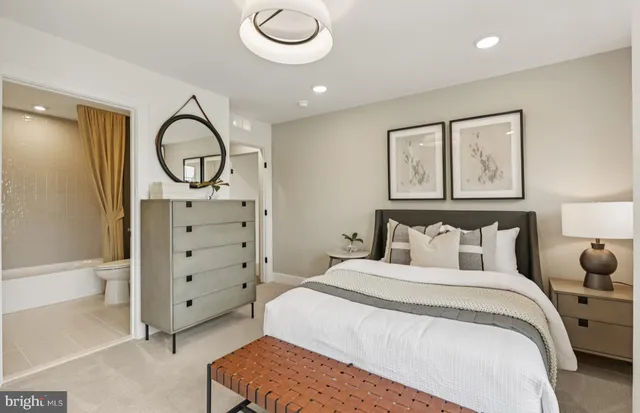 a bath room with double vanity sink and a mirror
