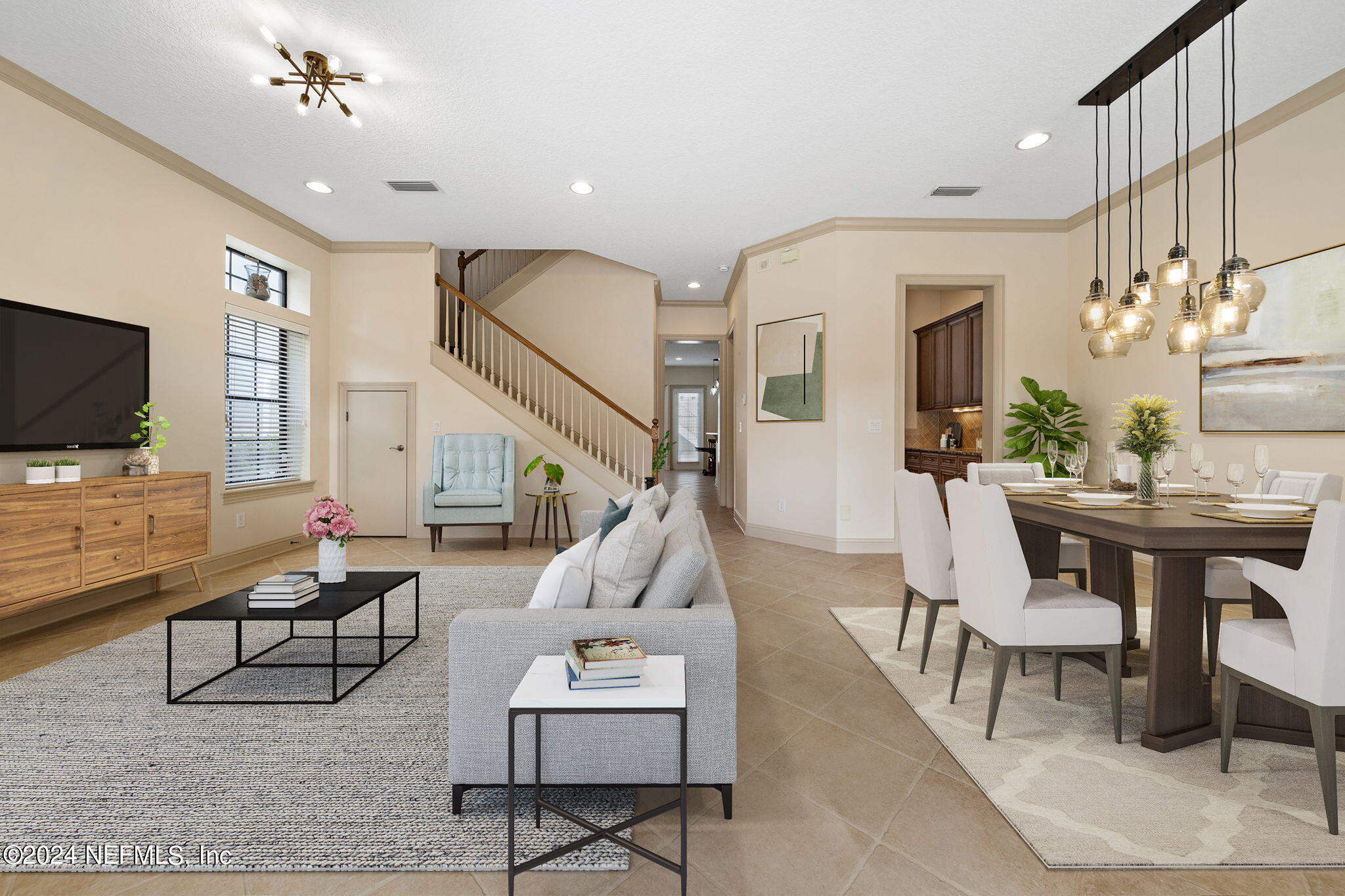 650 South Loop Parkway St. Augustine, FL 32095 - Photo 11 of 42 a living room with furniture and a flat screen tv