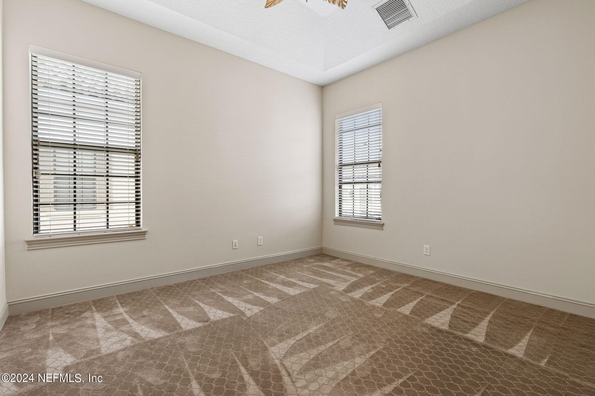 650 South Loop Parkway St. Augustine, FL 32095 - Photo 19 of 42 an empty room with windows