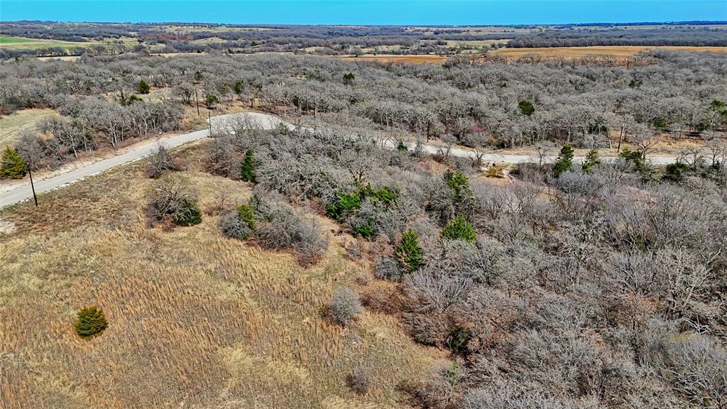1887 Red Oak Hills Road Nocona, TX 76255 - Photo 7 of 32 a view of outdoor space and yard