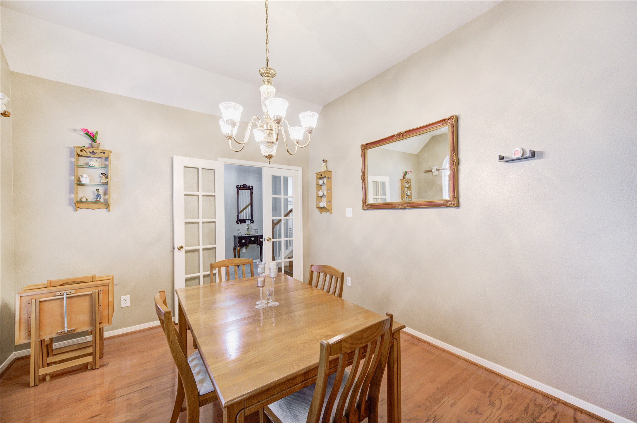 16730 Spring Barker Drive Cypress, TX 77429 - Photo 32 of 50 a view of a dining room with furniture and wooden floor
