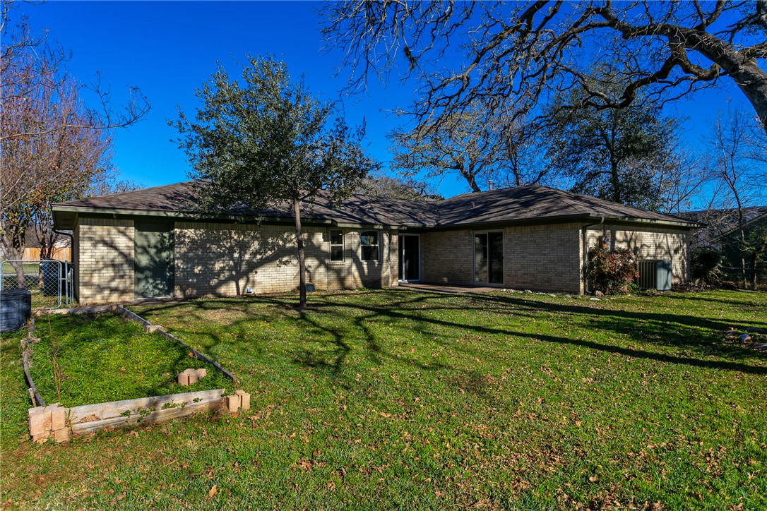 1308 Hawk Tree Drive College Station, TX 77845 - Photo 28 of 34 a view of a house with a yard