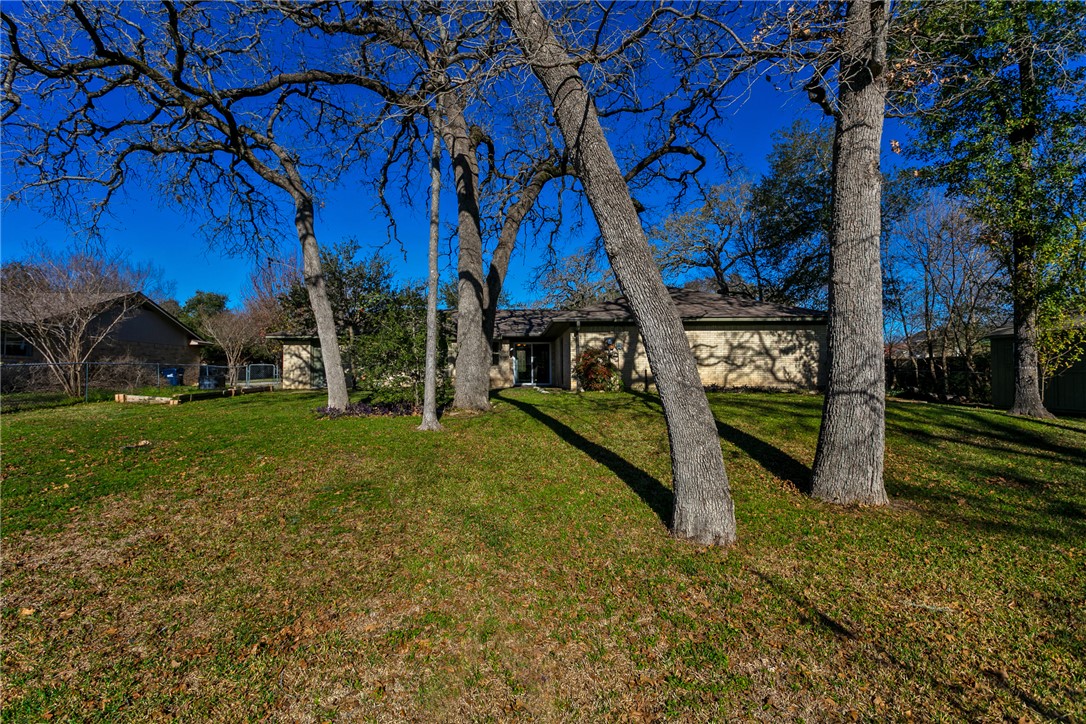 1308 Hawk Tree Drive College Station, TX 77845 - Photo 30 of 34 a view of a house with a yard