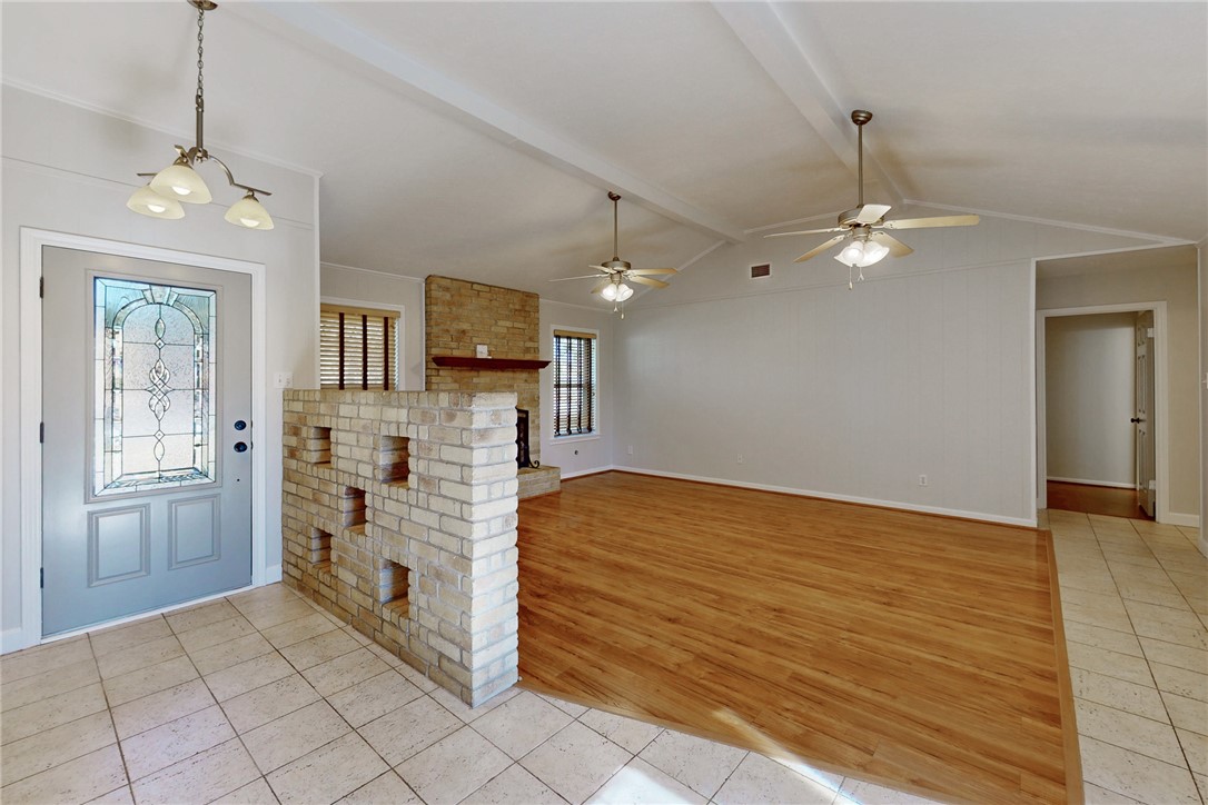 1308 Hawk Tree Drive College Station, TX 77845 - Photo 10 of 34 a view of kitchen with granite countertop cabinets and chandelier