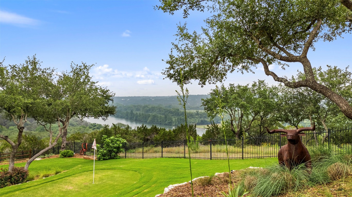 Rare and unique home in Bella Mar of Steiner ranch with unobstructed Lake Austin views, pool, large adjacent easement (.44) and detached casita from main house.