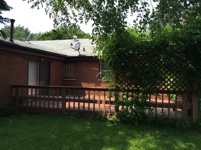 5925 107th Street Chicago Ridge, IL 60415 - Photo 17 of 21 a backyard of a house with lots of green space