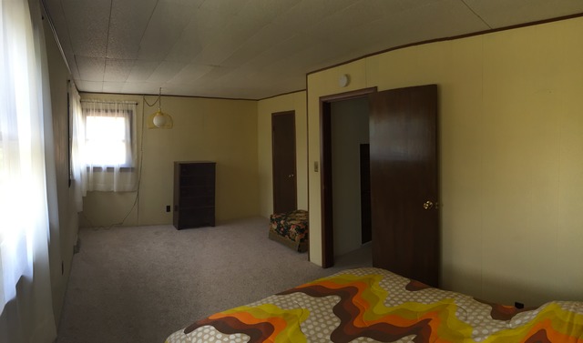 5925 107th Street Chicago Ridge, IL 60415 - Photo 8 of 21 a bedroom with a bed and a dresser