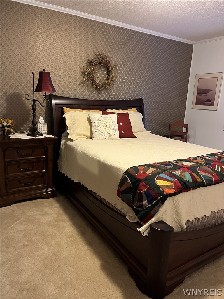 1999 Dugan Road Olean, NY 14760 - Photo 28 of 30 Patterned accent walls and plush carpeting create