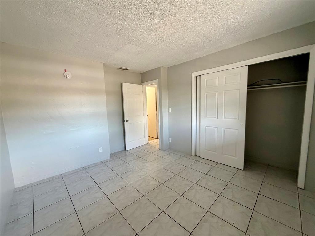874 Southwest 10th Drive, Unit 741216 Pompano Beach, FL 33060 - Photo 16 of 16 a view of an empty room